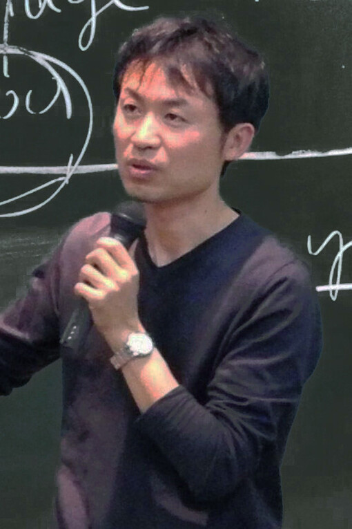 Masahiko Abe during a conference
