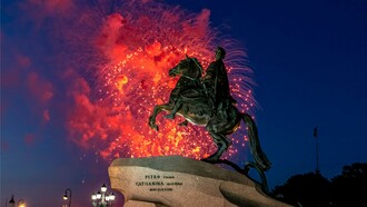 The statue of Peter the Great framed by fireworks, representing the imperial legacy that continues to influence Russian leadership