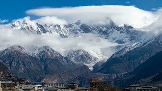 A sweeping view of Almora’s ridgelines, where layers of mountains fade softly into the Himalayan horizon