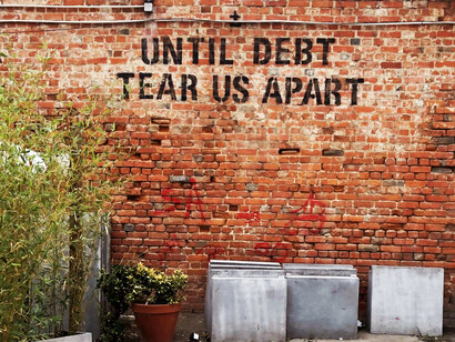 Wall art representing the problems brought about by debt