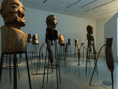 Kader Attia, J’Accuse, 2016, installation view, Kader Attia, 2017, Museum of Contemporary Art Australia, Sydney, 2017, teak, steel rebar, single-channel digital video, projection, colour, sound, courtesy the artist and Galerie Nagel Draxler, Berlin/Cologne, image courtesy the artist and Museum of Contemporary Art Australia © the artist, photograph: Jacquie Manning