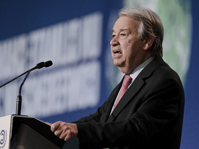 Secretary-General António Guterres speaks passionately at a United Nations conference, highlighting the growing influence of NGOs, corporations, and activist groups in the international arena