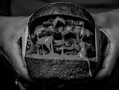 In many developed countries, the 'bigger' the hamburger, the more appealing as seen here loaded with cheese and bacon and other fat
