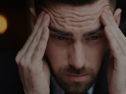 Emotional expression captured in images of a distressed man crying, experiencing loss and grief, mourning death, and depicting sadness and sorrow