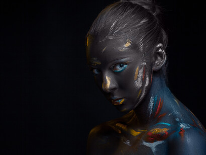 Just as the dark body paint envelops the model, AI is now deeply integrated into the creative industries, offering artists new ways to innovate and break through creative barriers