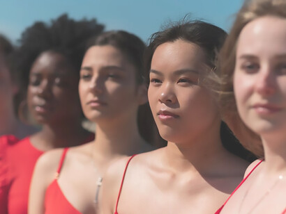 Embodying empowerment: medium shot of women together, advocating equality outdoors