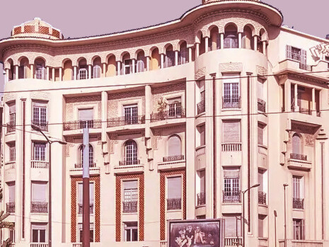 Captivating details of Casablanca's streets showcase the unique charm of French architectural design in Morocco, highlighting the enduring legacy of colonial history in Morocco's urban landscape