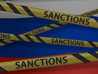 Yellow tape with sanctions sign: a vivid symbol against Russia, depicting implications of imposed sanctions