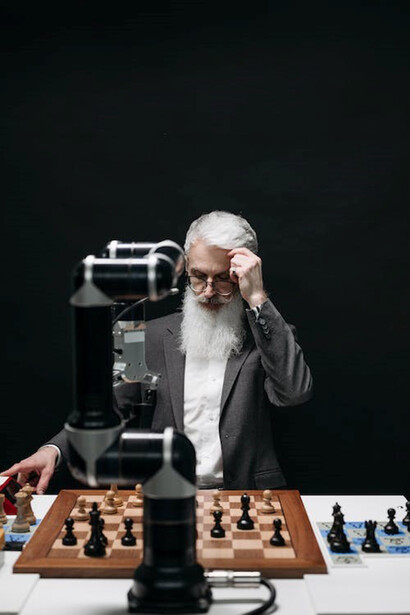 Engaging in a strategic battle, robot and human facing off in chess