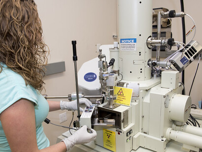 Scientist Nicole Overman uses the Scanning Electron Microscope (SEM) to perform high resolution electron microscopy studies of structural materials, courtesy of Pacific Northwest National Laboratory