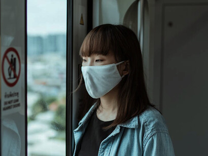 The woman closes her eyes and lets her imagination take flight, in this fleeting moment between destinations, she becomes a nomad of the mind, traversing landscapes of memory and anticipation