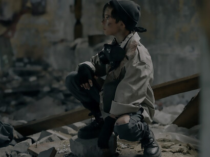 In a grim portrayal of the future, a lone child traverses the ruins of a decaying structure, an oxygen mask draped around her neck, symbolizing the haunting atmosphere of desolation