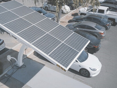 The decarbonization plan involves charging the electric car with renewable energy, a significant step forward in green projects aimed at reducing carbon emissions