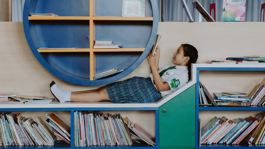 Girl in school reading, deep in concentration, mastering the art of focus