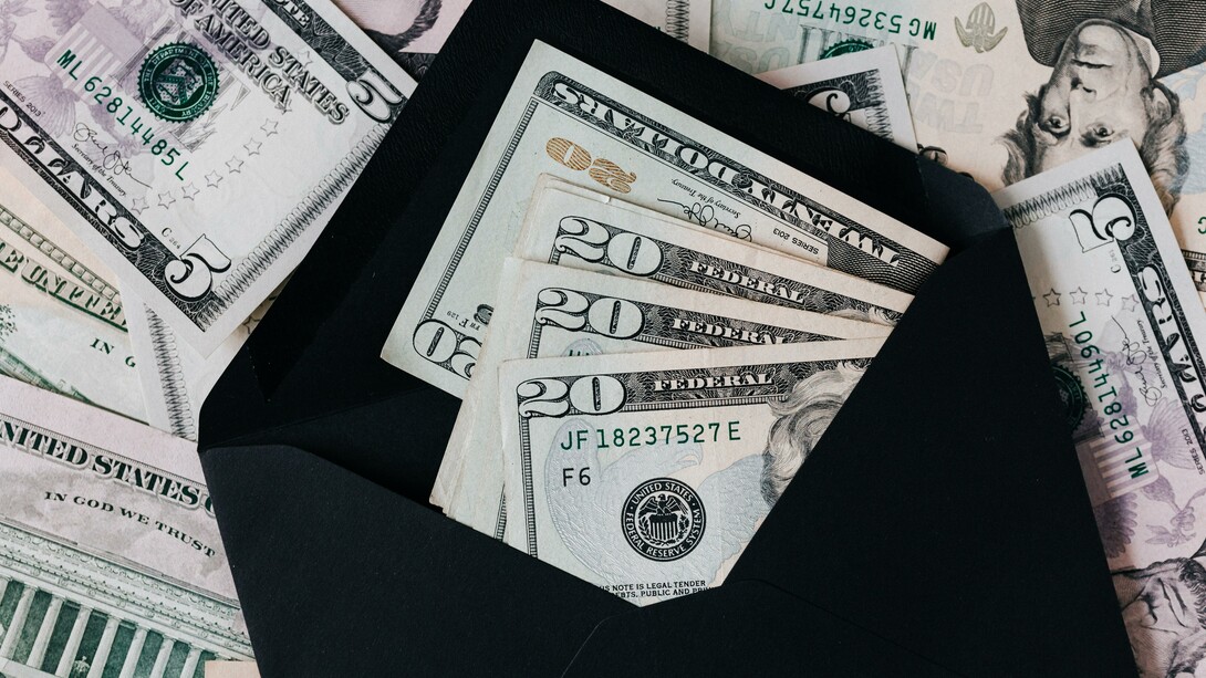Dollars in an envelope