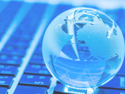 The future of multilingual communication with a glass world on a laptop, utilizing AI interpreters