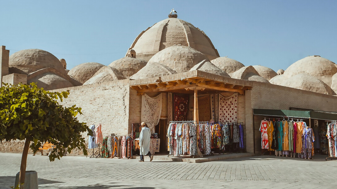 Traditional street photography in Bukhara, Uzbekistan, showcasing vibrant local shops and unique architecture