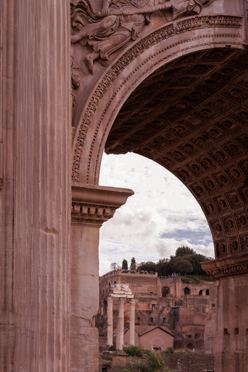 The Arch of Septimius Severus, a white marble triumphal arch at the northwestern end of the Roman Forum in Rome, Italy, dedicated in 203 AD to commemorate the Parthian victories of Emperor Septimius Severus and his two sons, Caracalla and Geta