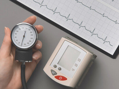 Explore educational insights with visuals showcasing a person using a tensiometer for precise blood pressure readings, emphasizing the significance of proactive cardiovascular health monitoring