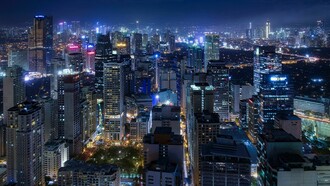 Through ethnographic research in Tondo, sociologist Marco Garrido explains how the drug war was supported because drug-related disorder directly threatens the fragile livelihoods and communal survival of urban communities. Makati City lights, Metro Manila, Philippines