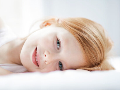 As she drifts into sleep, the girl's mind dances with visions of far-off lands and endless possibilities, she hears whispers of promises of adventure, igniting her spirit with the desire to explore the world beyond