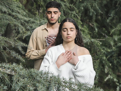 A couple embarking on a journey of self-discovery in the embrace of nature, intentionally distancing themselves from external pressures and influences