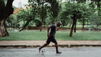 Embarking on his daily run, a man strives to find balance between effort and recovery, the key to sustaining peak performance and health