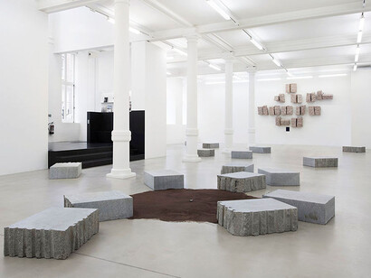 Installation view. Il panorama verso oltremare intorno dove le stelle si avvicinano di una
spanna in più, 2001, Diorite granite stones, Oltremare paint, 10 x 23 x 31 in. (25.4 x 58.4 x 78.7)