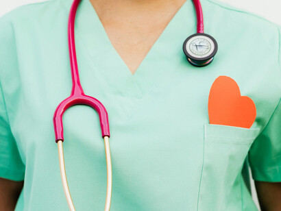 A stethoscope hanging from a nurse's neck
