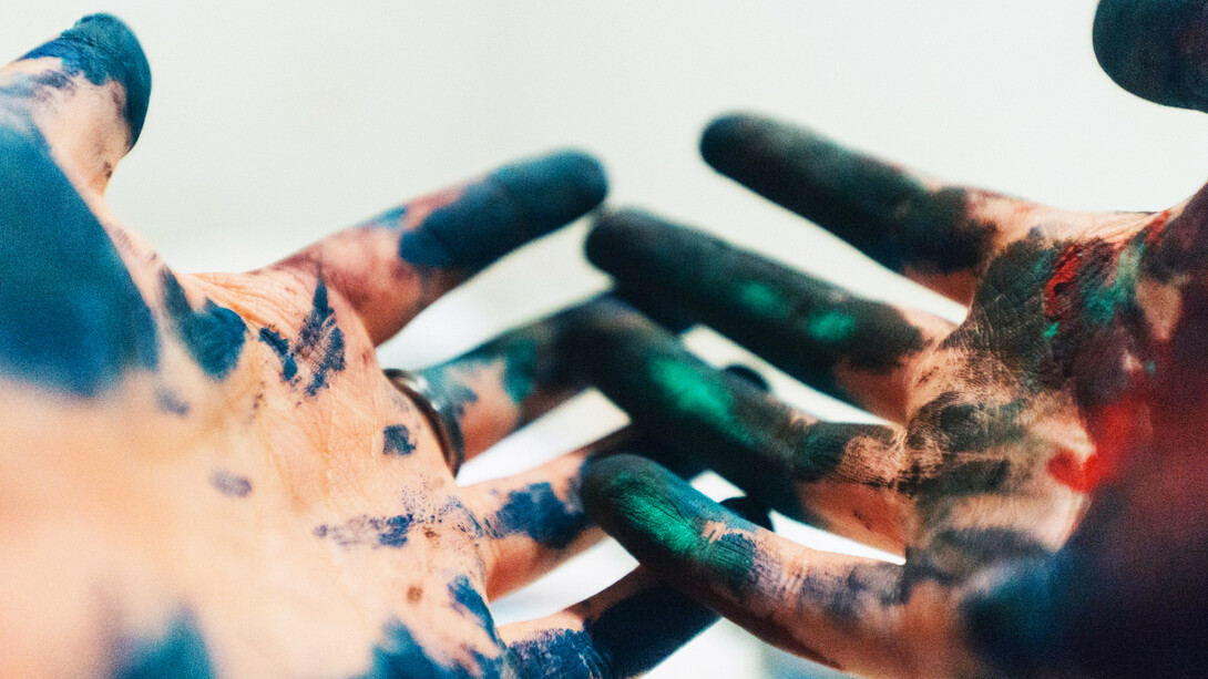 Painted hands; formalism represents the importance of intention and purpose in art