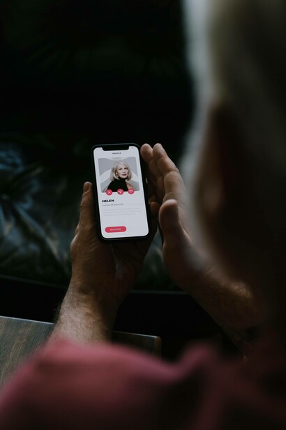 Man observes profile on dating app