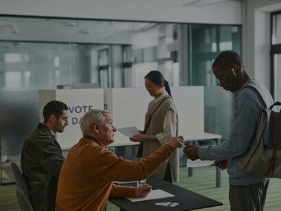Voters receive final instructions before heading into the booths to vote