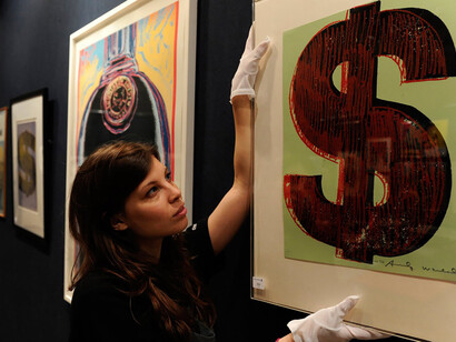 The number of sales of artworks priced above a million dollars increasing at a faster rate than other price brackets
