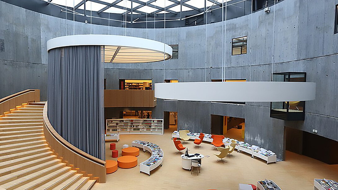 Discover the stunning atrium of the Oscar Niemeyer Library located inside the Petit Volcano in Le Havre