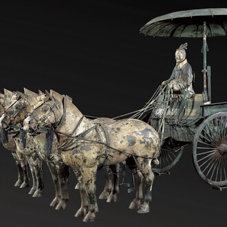 Four horse open chariot with a standing driver (replica). Courtesy of the Museum of Fine Arts