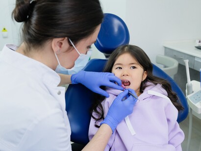 Young girl has an oral examination