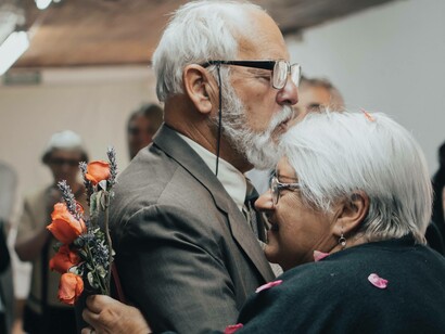 An elderly couple dancing in an attempt to feel youthful