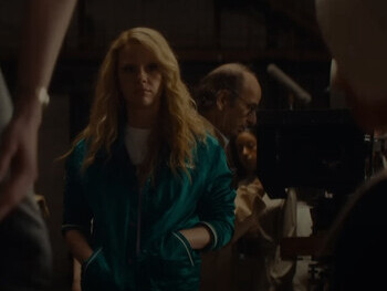 Mia Goth and Lily Collins in a scene from MaXXXine