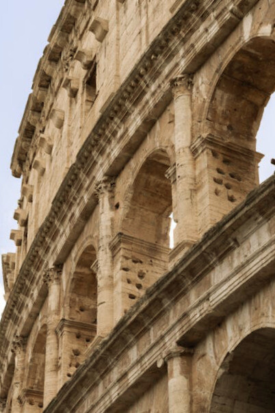 The intricate arches of the Colosseum in Rome, Italy, not only showcase ancient Roman engineering prowess but also invite reflection on the spectacles and cultural values that shaped an empire