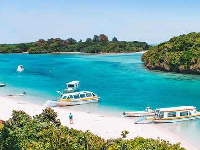 A group of boats that are sitting in the water
Kabira Bay in Ishigaki Island, Okinawa, Japan