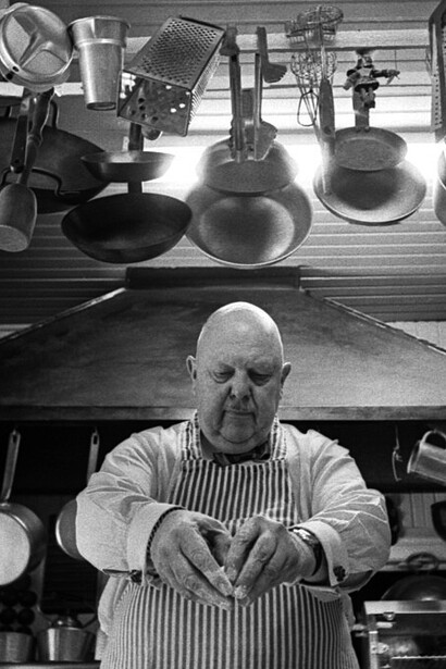 James Beard, chef and food writer in a kitchen