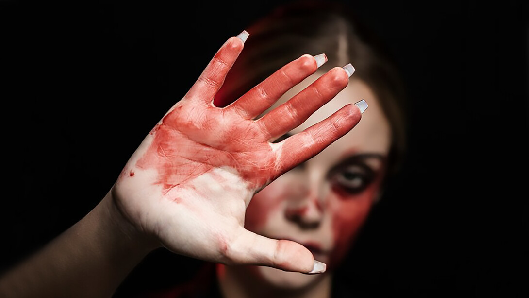 A woman with bloody hand