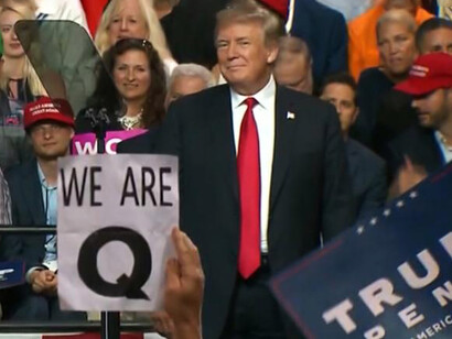 Donald Trump appears to be a Q fan