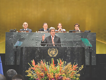 U.S. Secretary of State John Kerry engages in the UN Paris Agreement Entry into Force event at the United Nations in New York City, New York on September 21, 2016