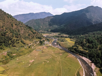 Green glass fields and mountains in Arunachal Pradesh, India