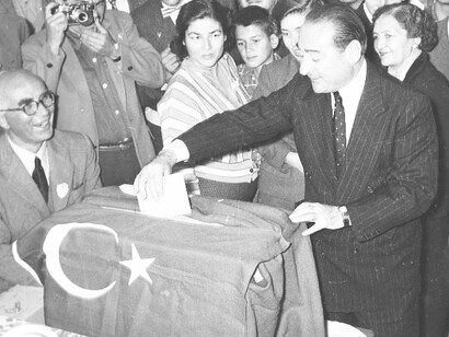 Prime Minister Adnan Menderes casting his vote in the 1954 elections