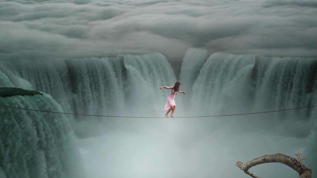 The act of balancing on a tightrope in order to effect change in one of its alterations