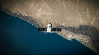 Space archaeology satellite imagery revealing archaeological sites and ancient landscapes from space, including aerial views of lost and buried cities