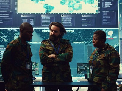 Military officers from diverse backgrounds utilizing cutting-edge holographic technology to assess real-time data and refine strategic operations in today's techno-fascist environment