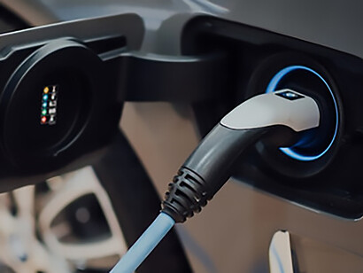 The electronics sector embraces sustainability through innovations such as electric cars and the establishment of eco-friendly charging stations, fostering the widespread adoption of clean energy solutions